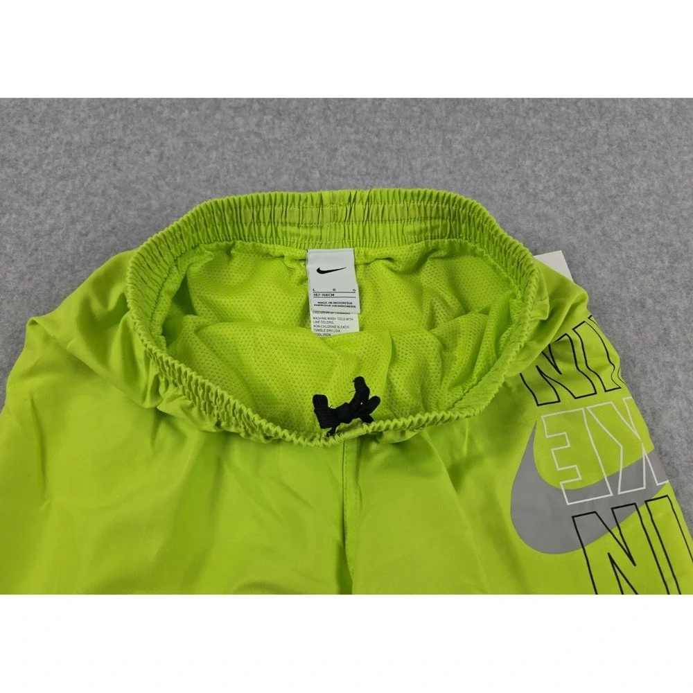 Nike Swim Boys Size Large‎ Swimming Trunks Shorts Green Logo Bathing Suit NEW